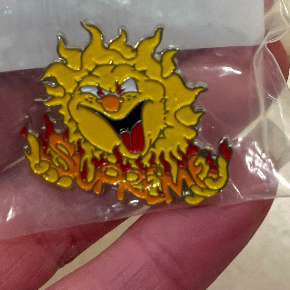Supreme sun pin